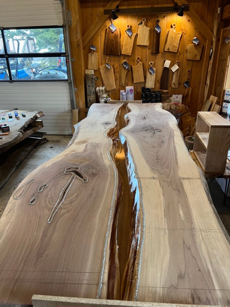 Conference tabletop during construction, with its epoxy centre and filled natural voids