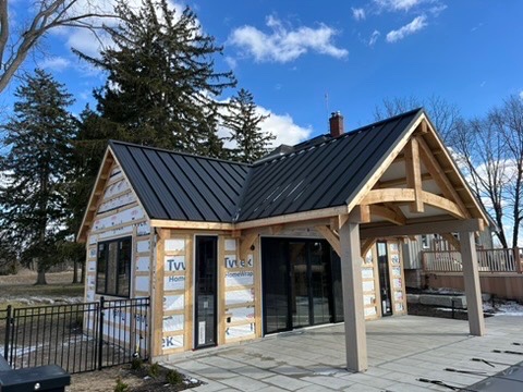 Pool-house front framing and unfinished walls during construction