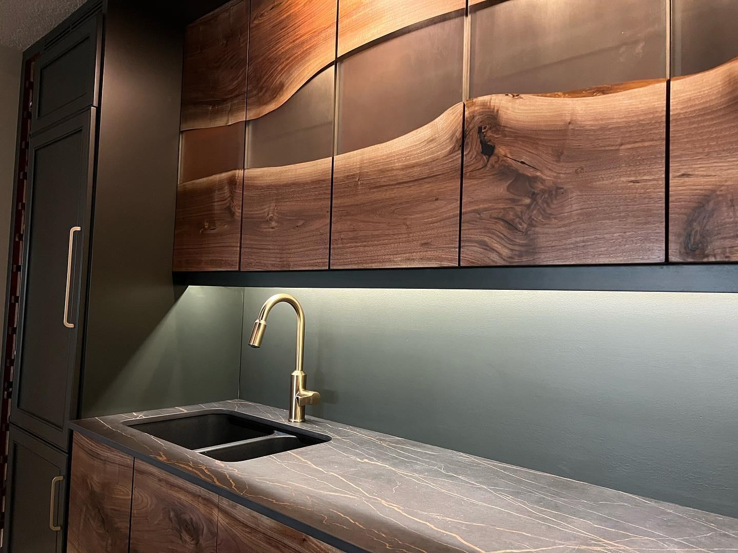 Walnut wet bar with live-edge epoxy doors and a natural stone countertop